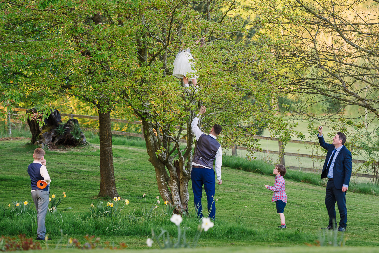 Guest trying to help little girl stuck in a tree at Russets Country House 