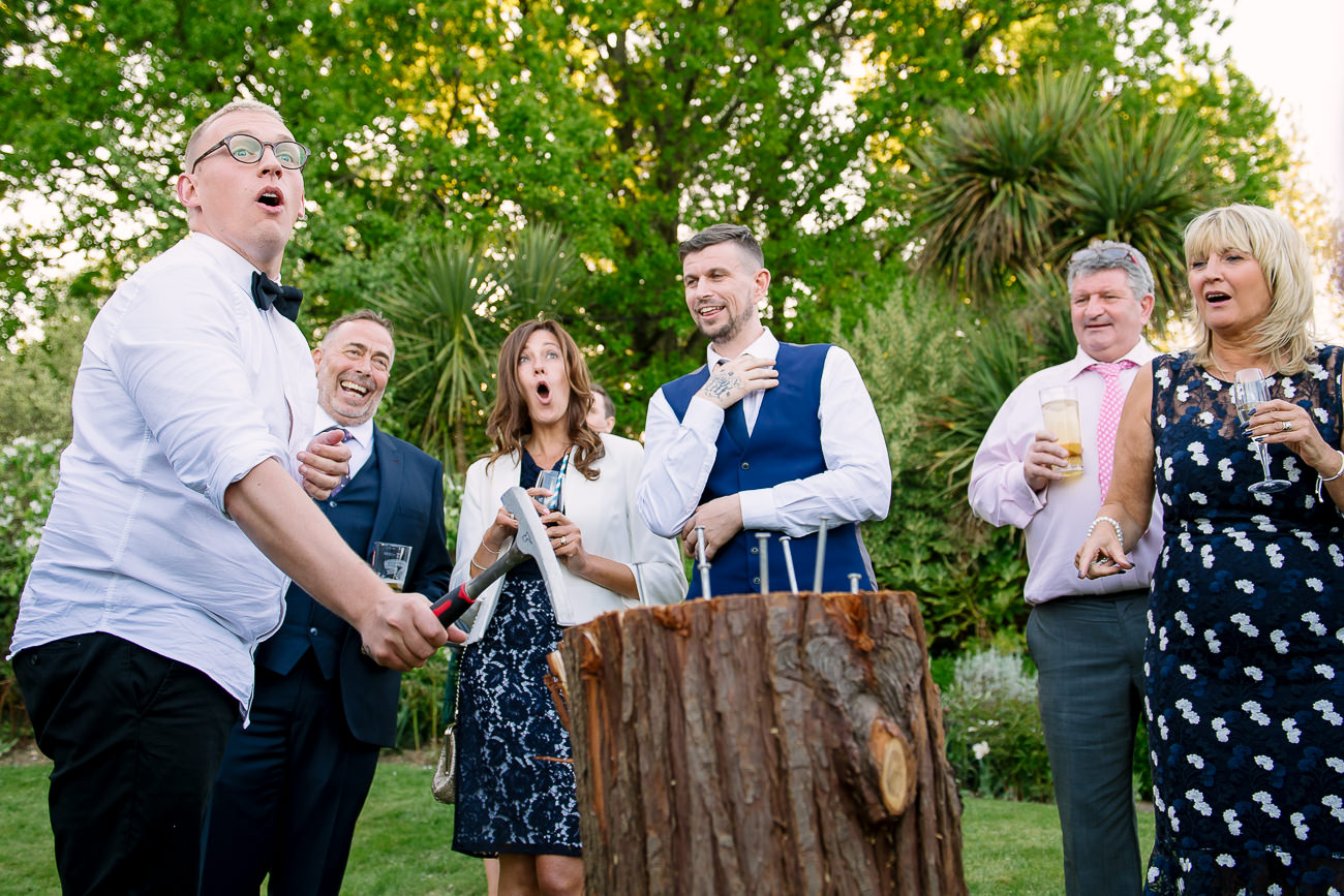 Guests playing stump drinking game at Russets Country House