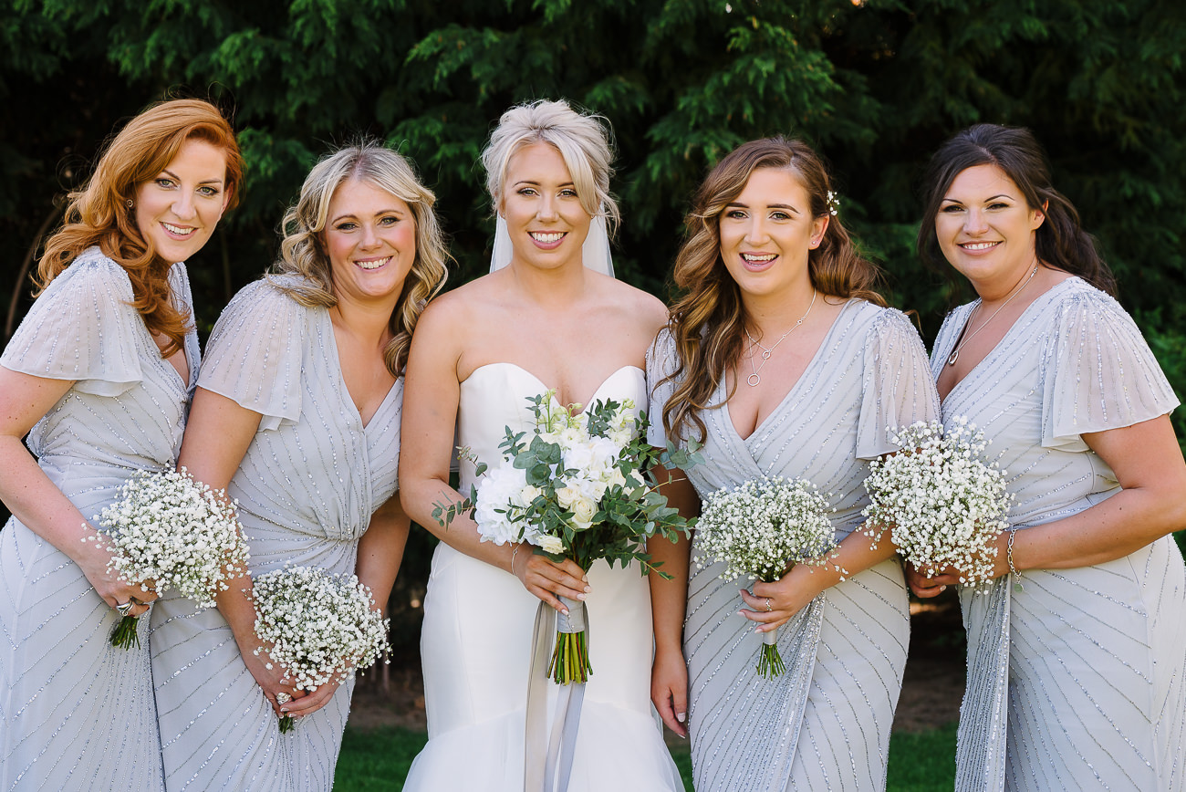 Bridesmaids and bride group photograph at Russets Country House 