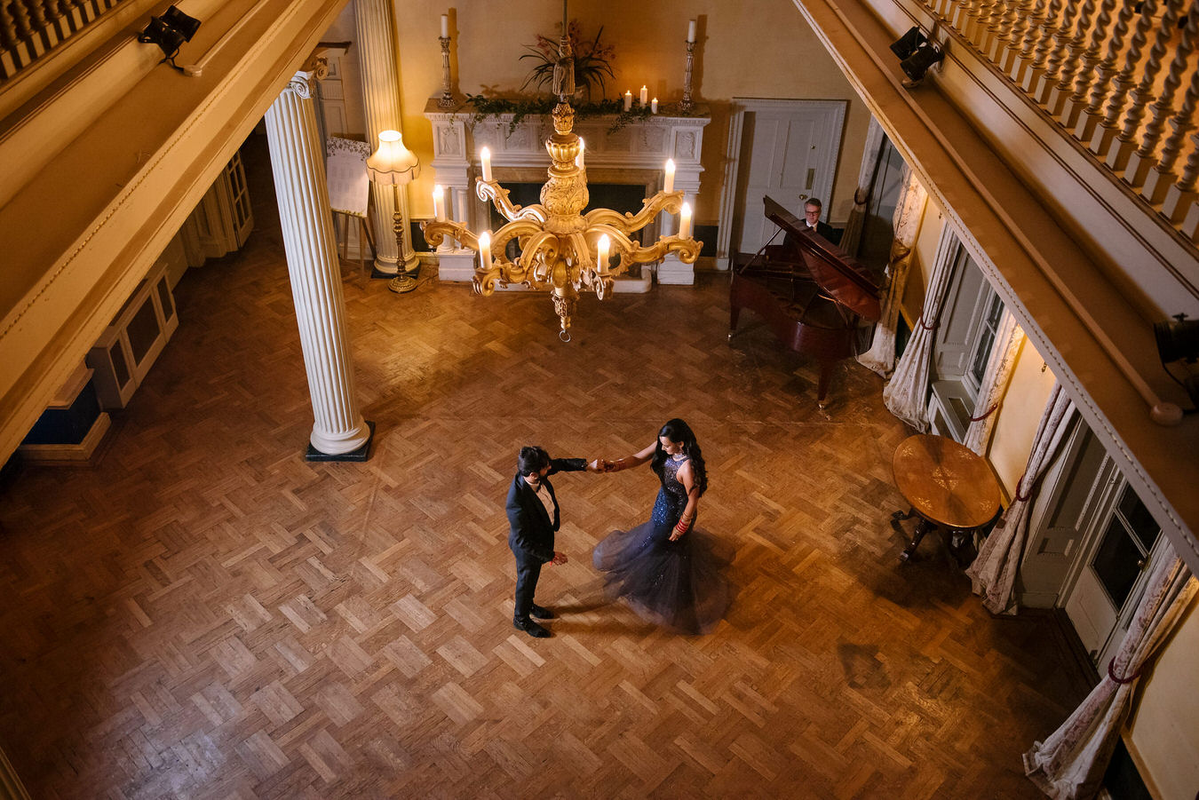 Sikh Wedding photography, bride and groom are dancing holding one hand