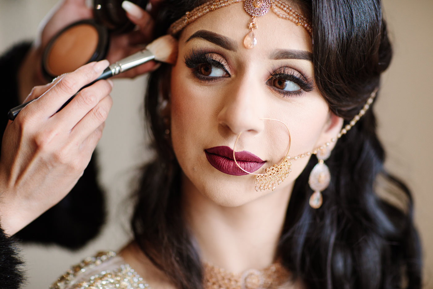 Asian bride make-up before muslim wedding