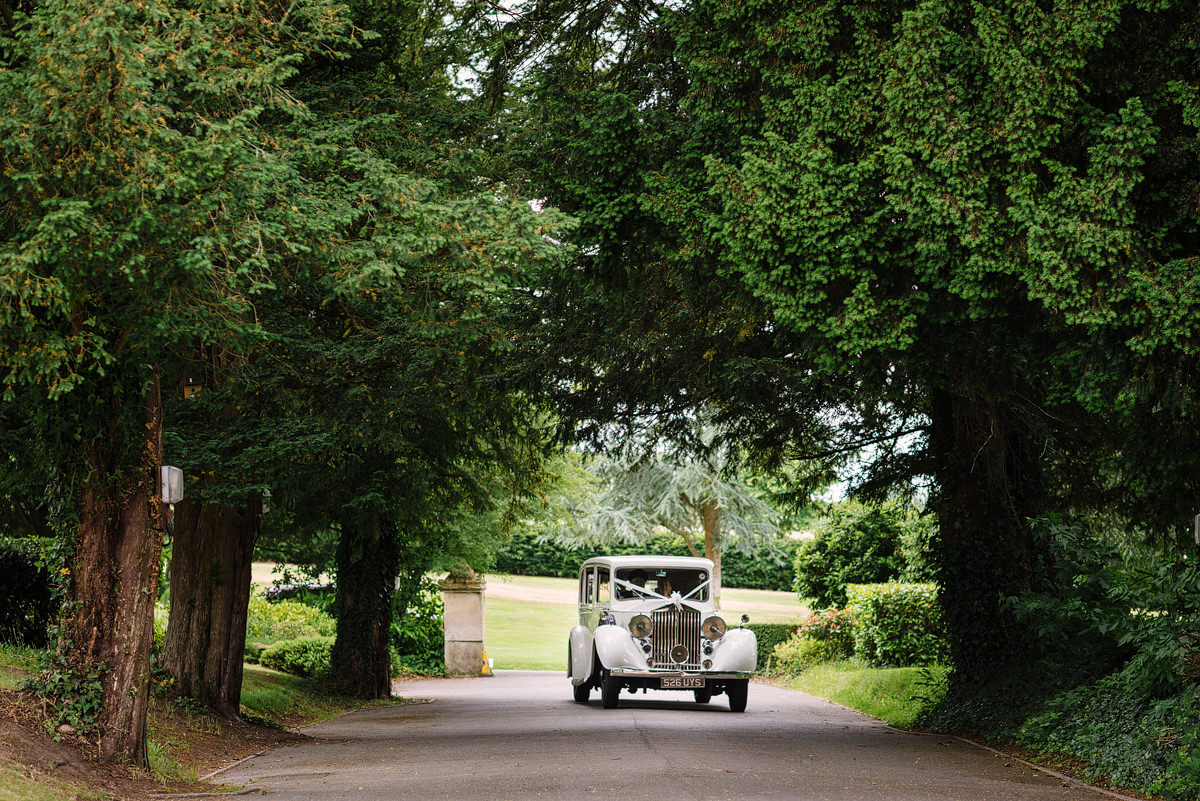 Wedding car arriving at Canford Parish Church