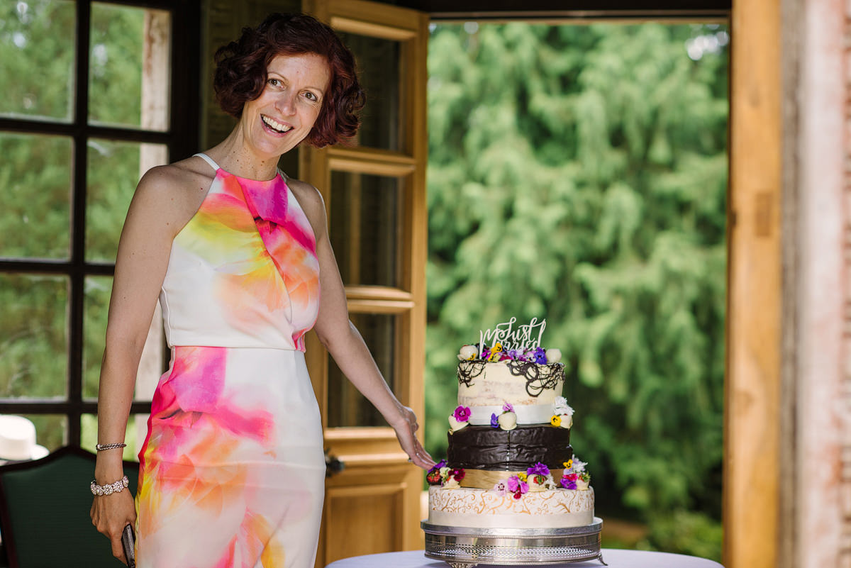 Mum showing presenting diy wedding cake