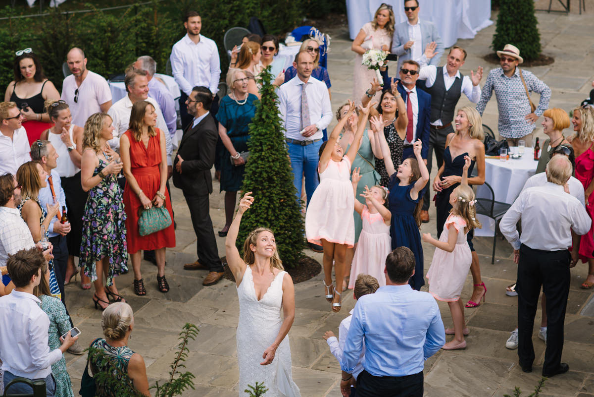 Bride throws her bouquet