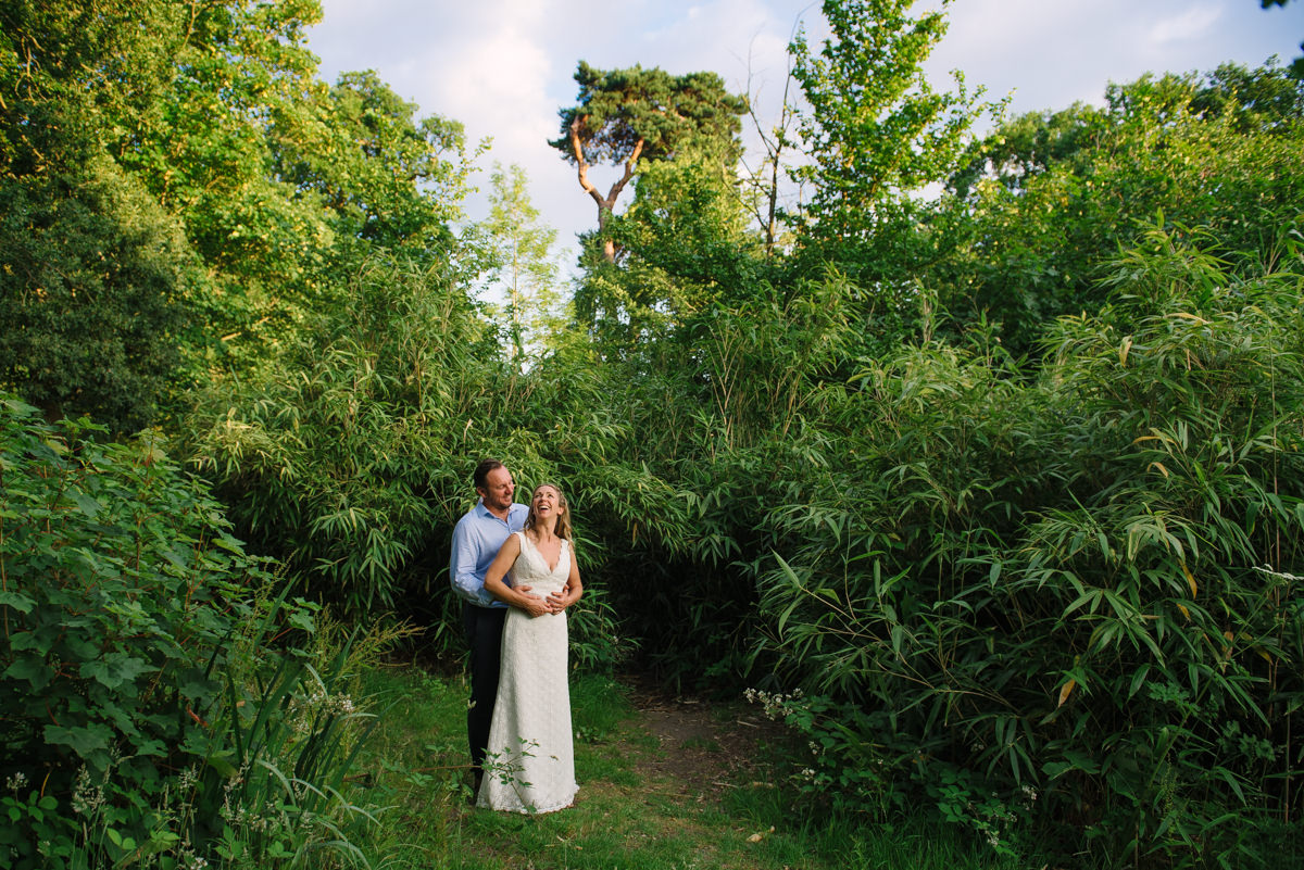 Richmond Wedding photography - Newly weds laughing at Pembroke Lodge