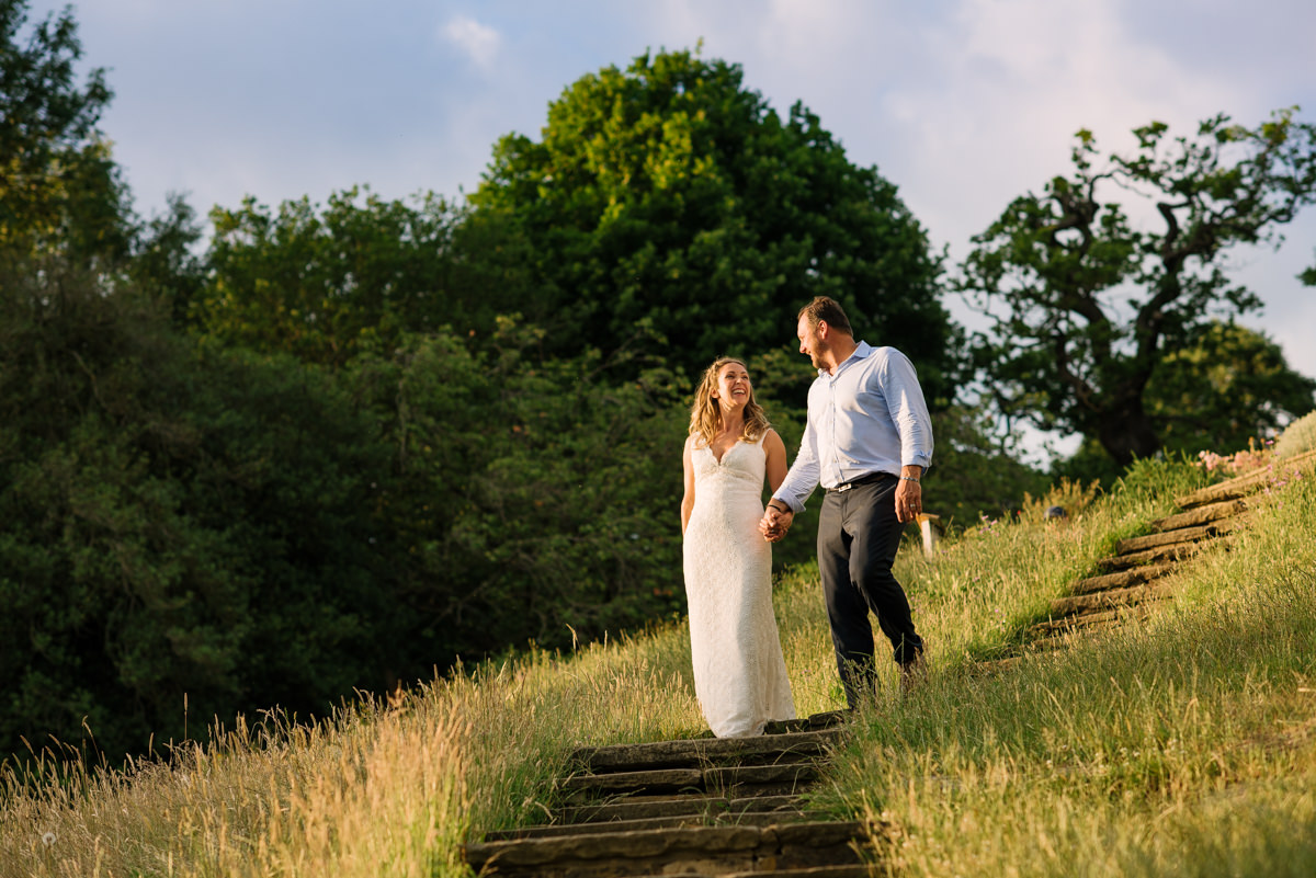 Happy wedding couple portrait at Pembroke Lodge in Richmond Park