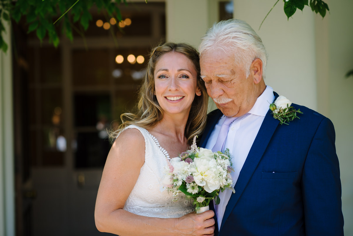 Bride and father moment before wedding ceremony 