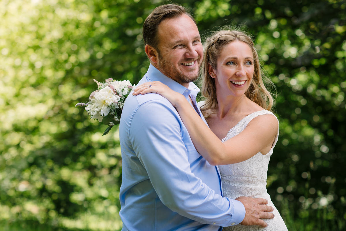 Bride and groom laughing