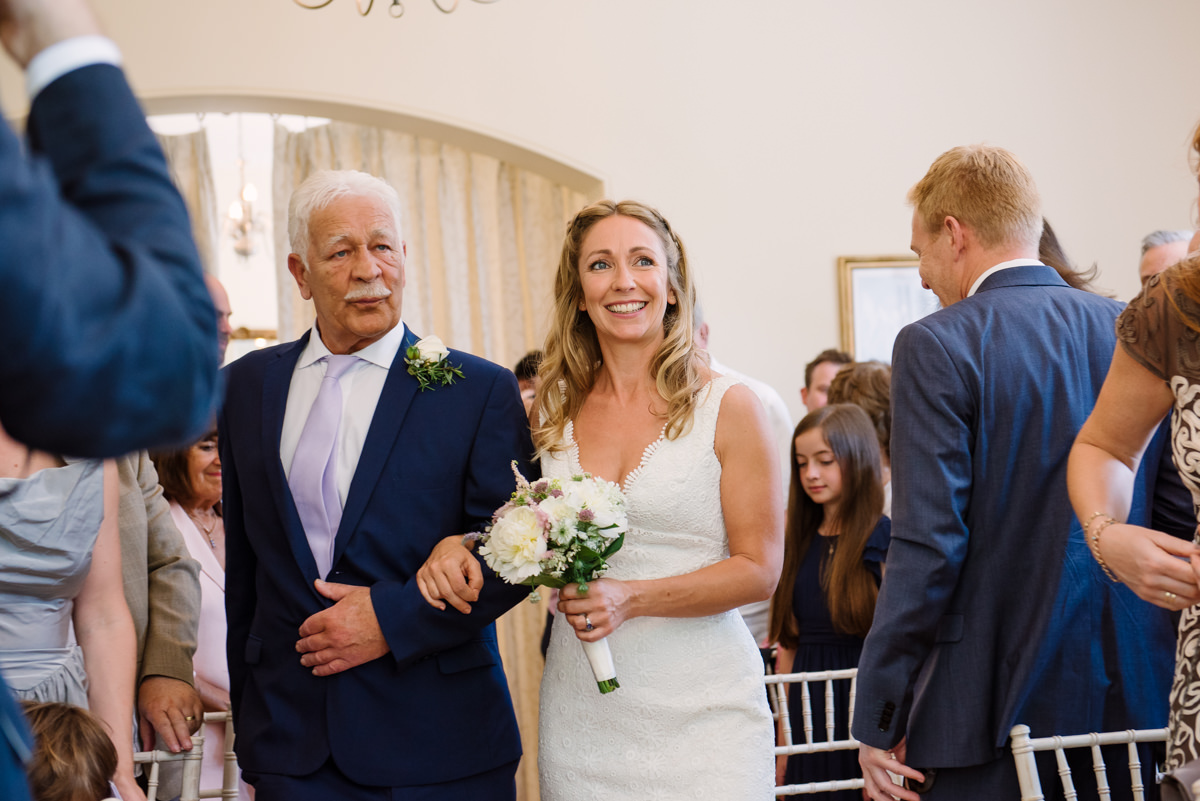 Bride and Father walking up the isle