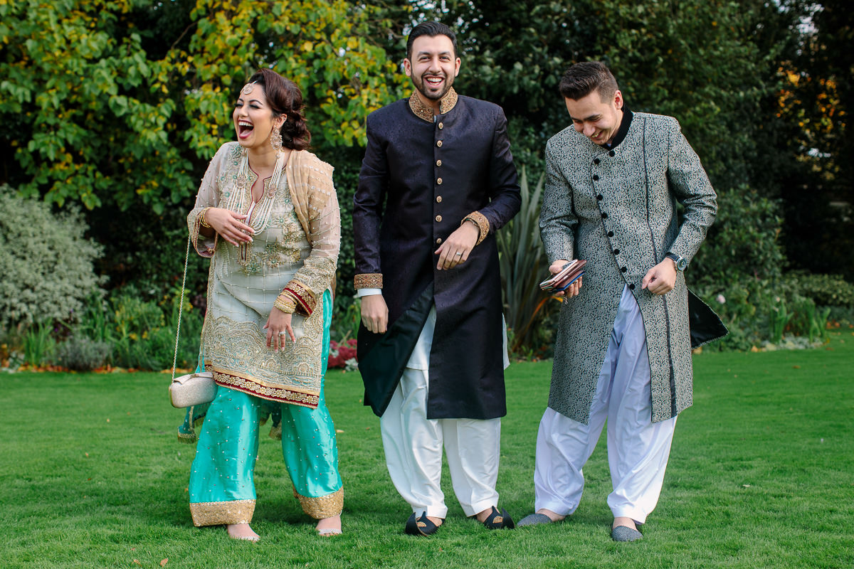 Muslim siblings at Asian wedding wearing traditional asian wedding costumes Alton House Hotel 