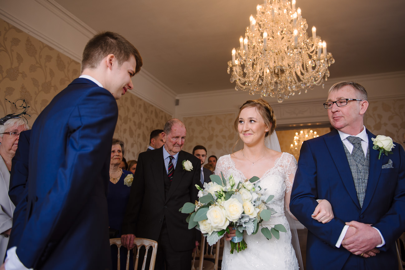 Father and Bride down the aisle at Froyle Park