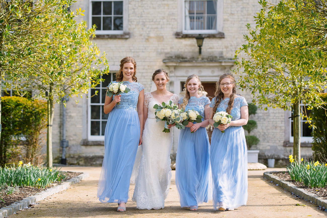 Bride and Bridesmaids having fun at Froyle Park