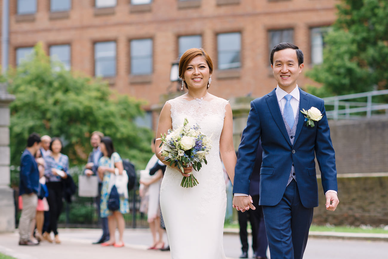 Bride and Groom leaving Guildhall Kingston Upon Thames after their wedding