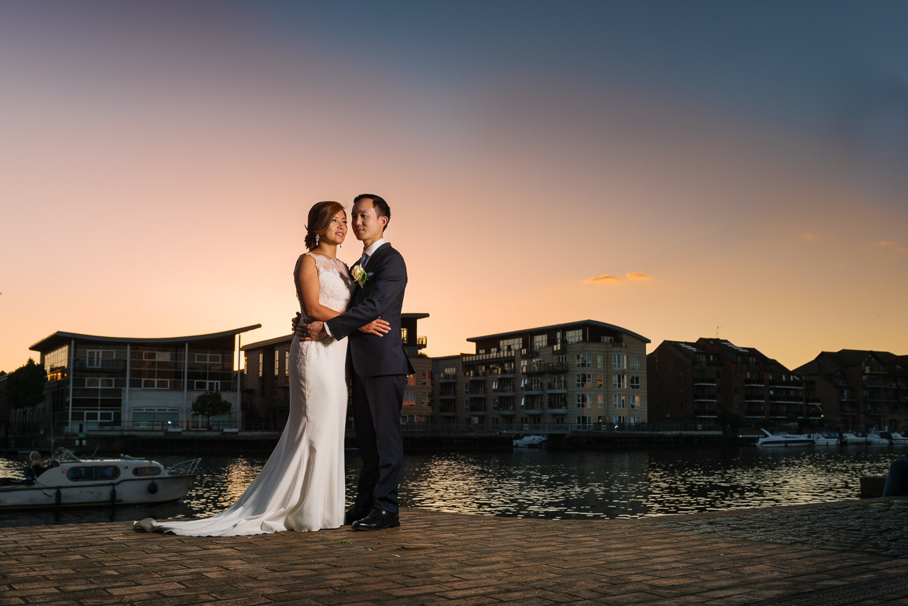 Wedding couple portrait by the Thames in Kingston