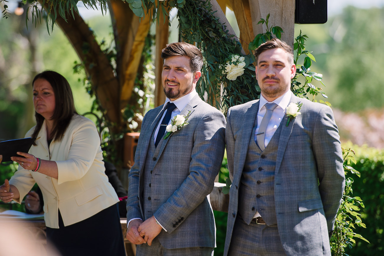 Groom and best man awaiting the bride