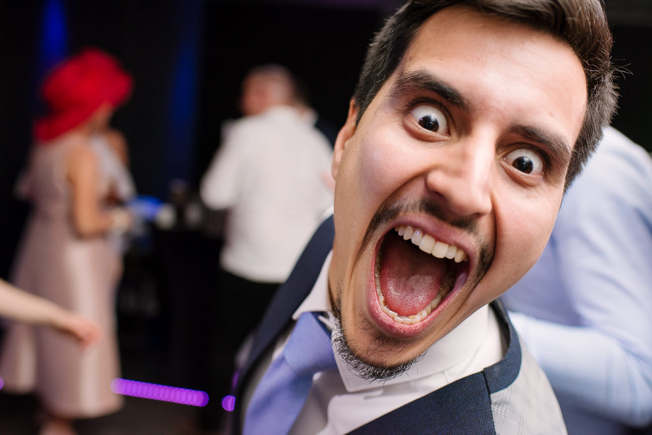 Guest pulling a funny face during the wedding party at Russets Country House 