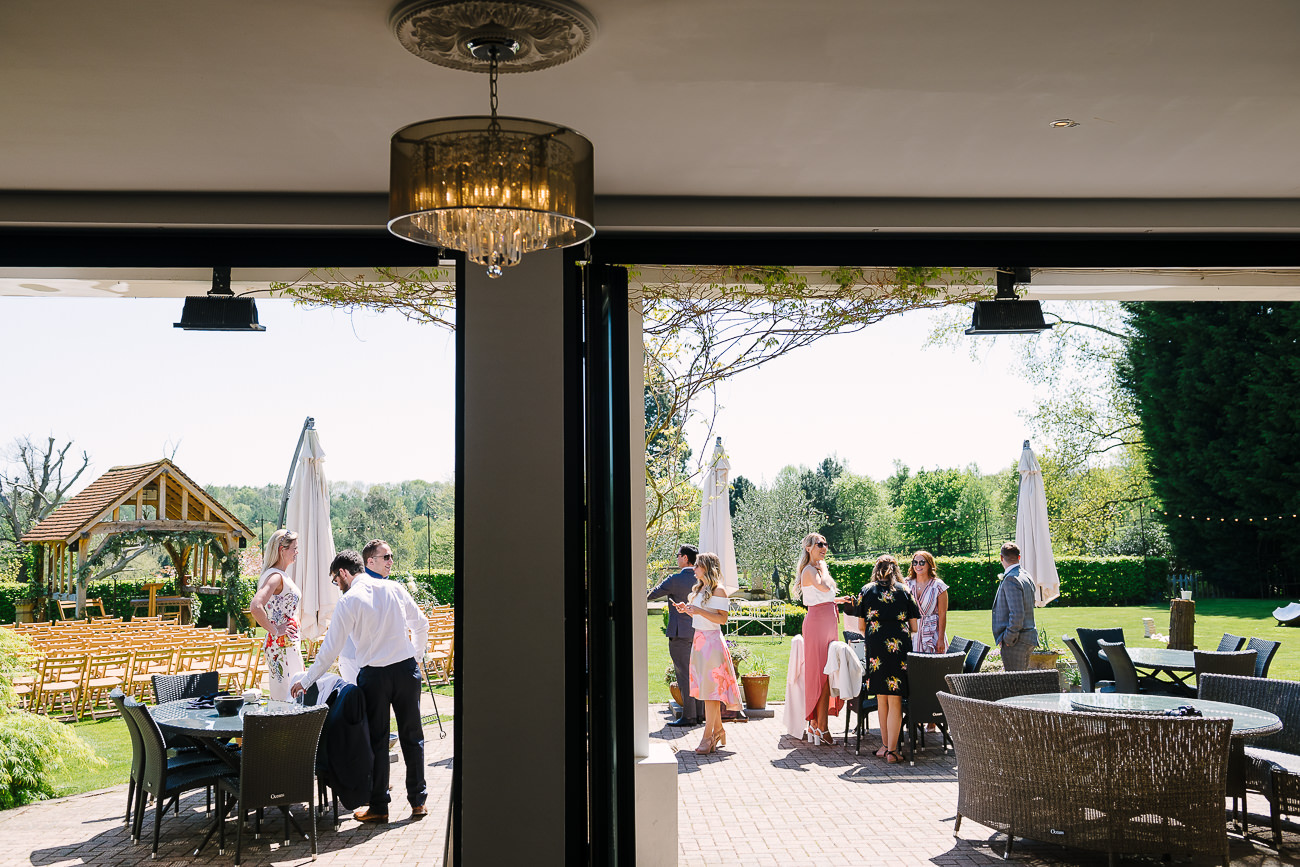 People enjoying the sun before the ceremony at Russets Country House