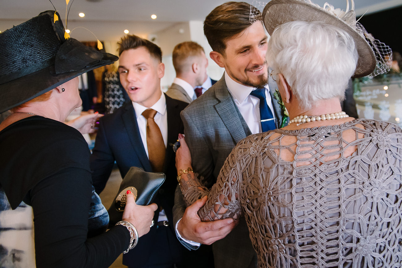 Groom greeting guests before ceremony at Russets Country House