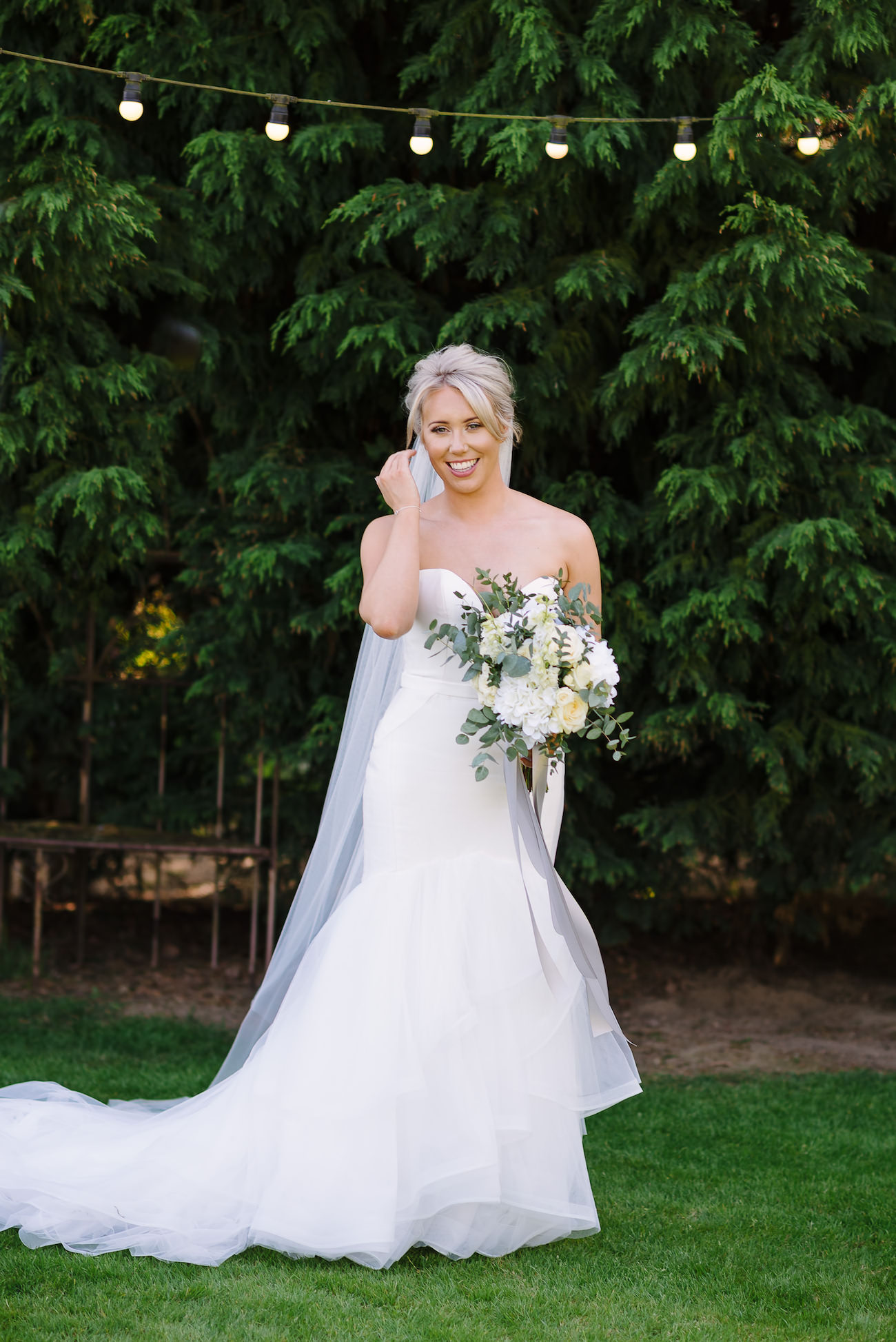 Bridal portrait with white flowers bouquet at Russets Country House