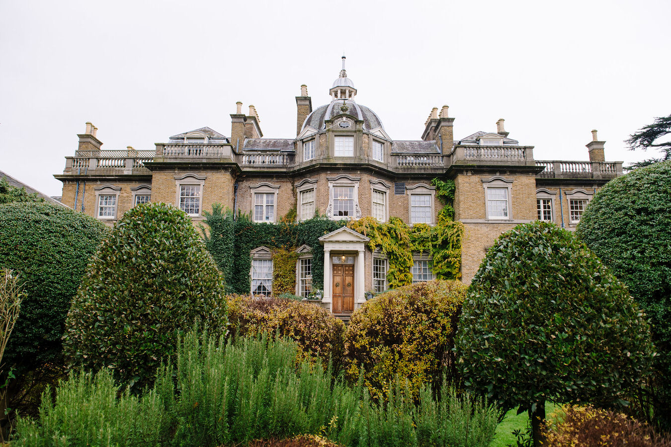 View of Hampton Court House façade and front garden