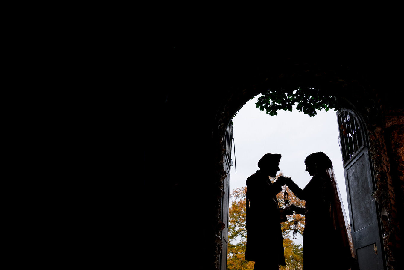 Asian bride and groom silhouette photograph.